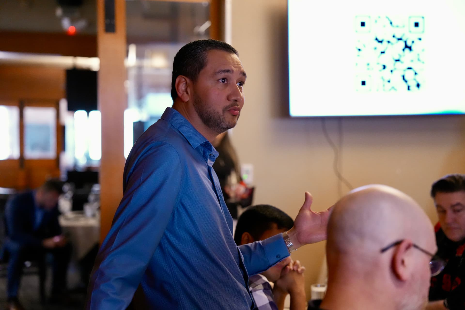 Guest joining the discussion at a Cyber In Color table